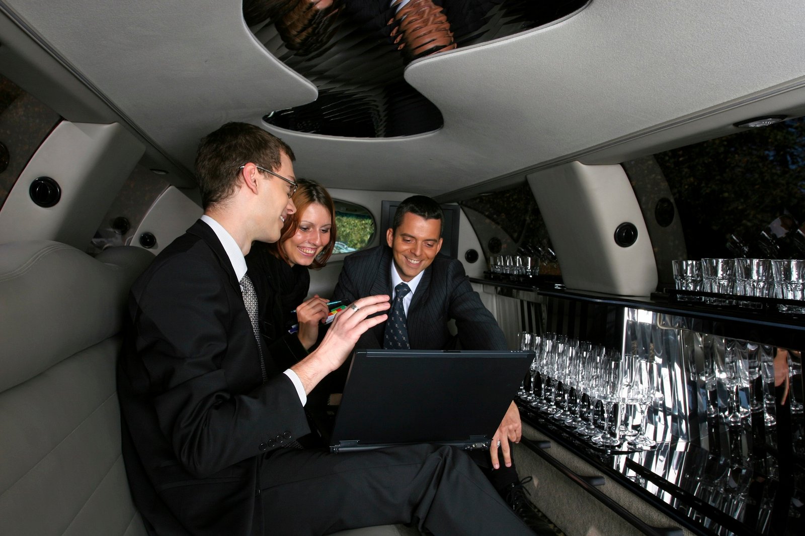 Business meeting in limousine